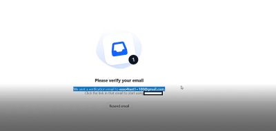 A screenshot displayed on a screen showing a confirmation message indicating that an email verification link has been sent to the user's registered address.